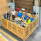 Employees inside shipping crate